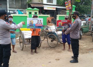 DEMI MENCEGAH PENYEBARAN COVID-19, POLSEK JATIROGO POLRES TUBAN MELAKSANAKAN GIAT YUSTISI PENDISIPLINAN PROKES